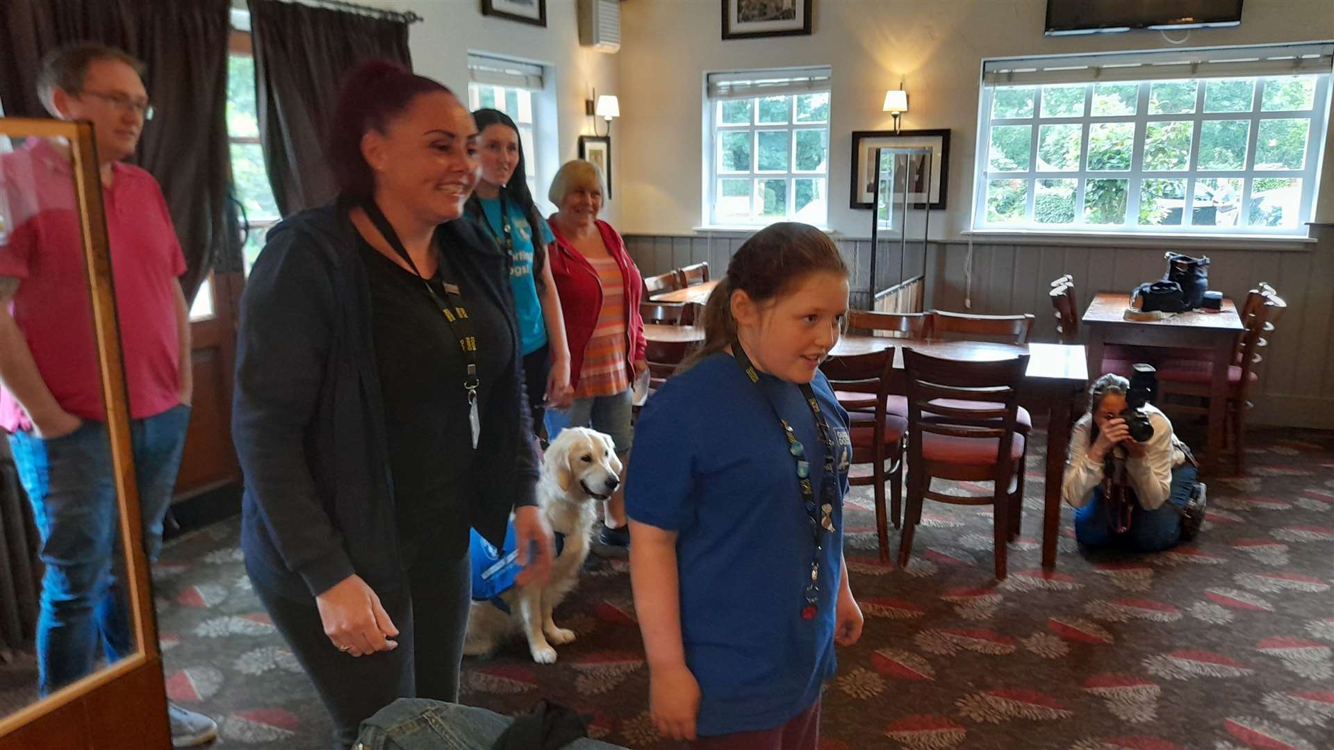Scarlett Elliott and mum Michelle excitedly await the introduction of Max, a trainee guide dog she named