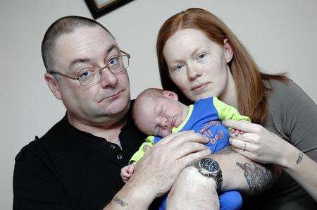 Rick Flynn and Joanna Hallett with newborn son Owen