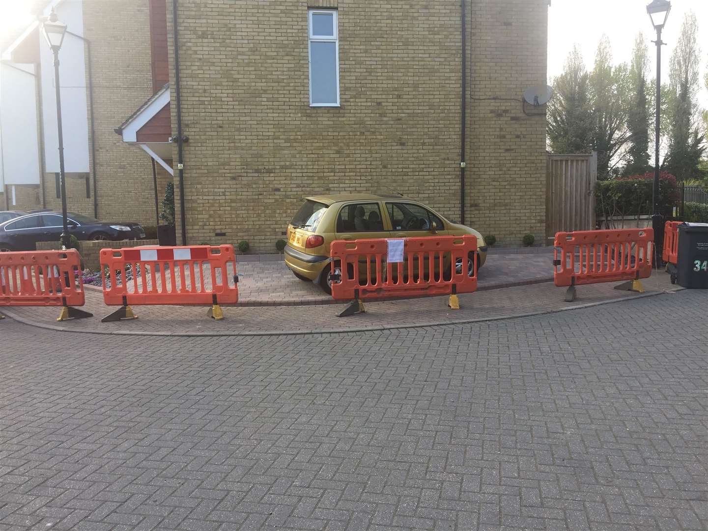 The barriers mean no one comes near Ms Barrett if she is coming in from her car or doing gardening