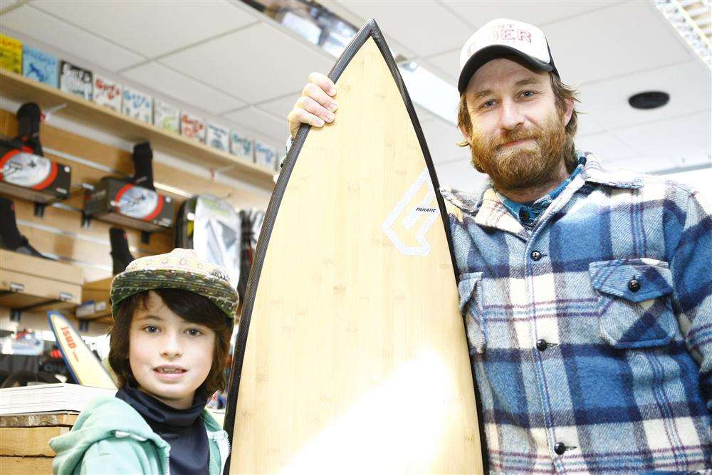 Ralph Grieve, 10, from Broadstairs, who has organised a boxing day sufr for Demelza House, with help from Dave Melmoth, owner of Joss Bay Surf Shop in the town High Street.