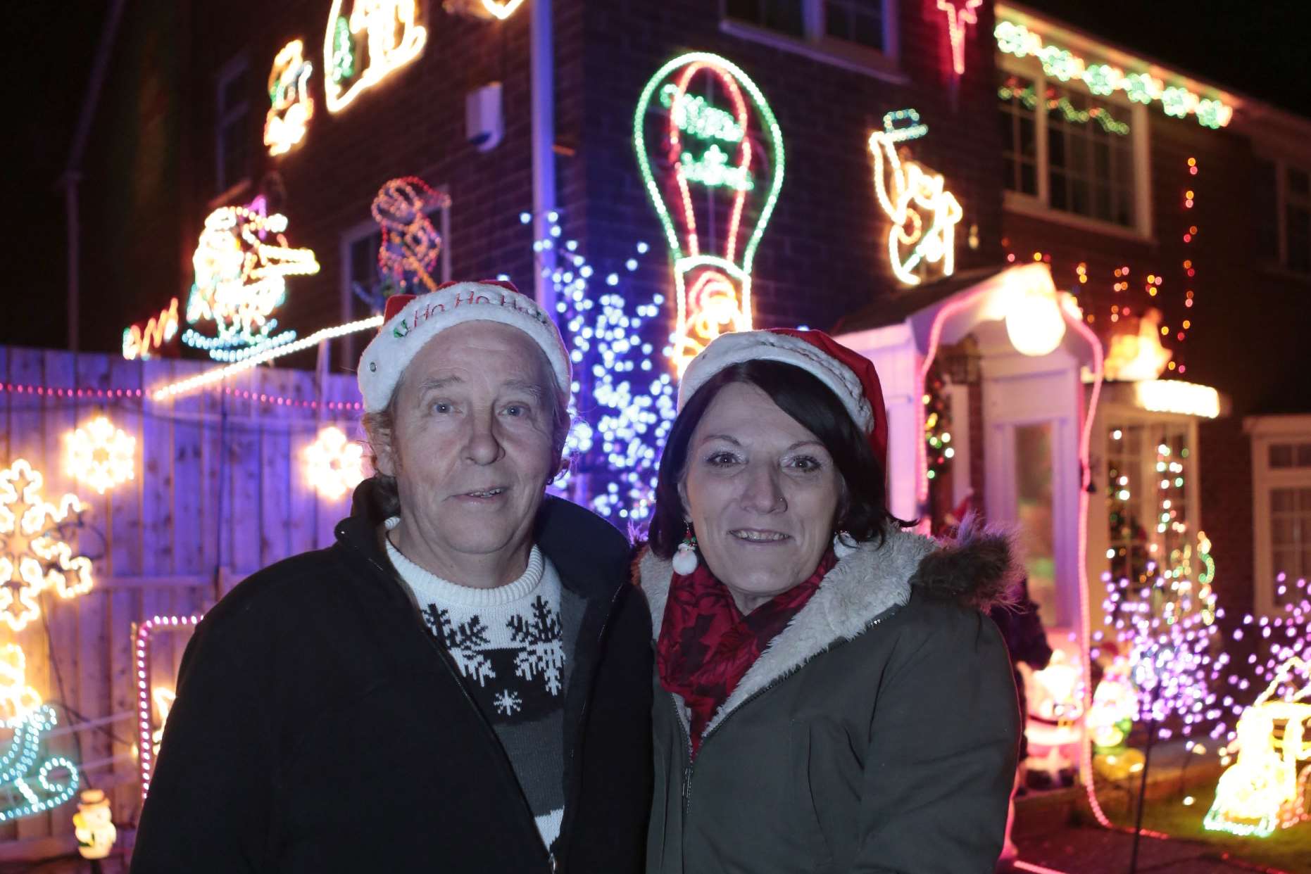 Kevin and Pat Green switch on their Christmas lights for charity