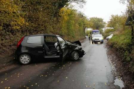 The damaged car which was in collision with a school bus just outside Elham