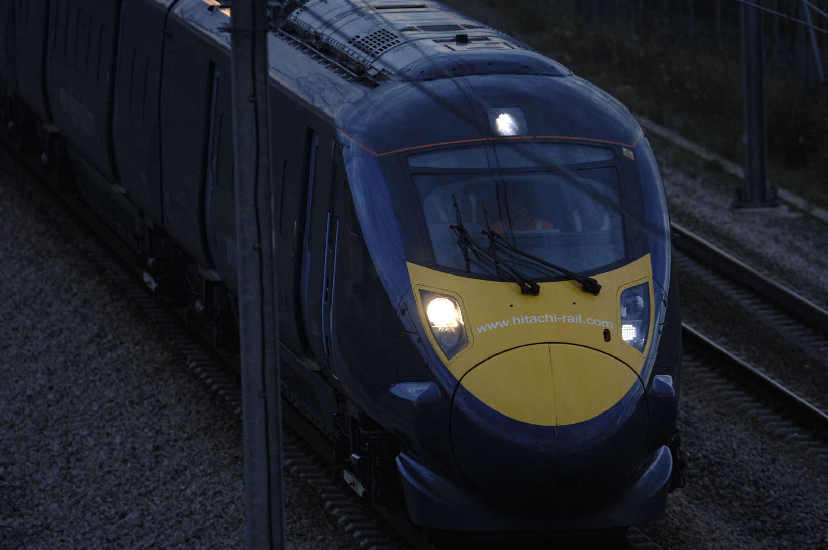 An archive photo of Kent's high-speed line showing a Hitachi train on the outskirts of Ashford making a night-time trial run to London St Pancras in 2008. Picture: Gary Browne