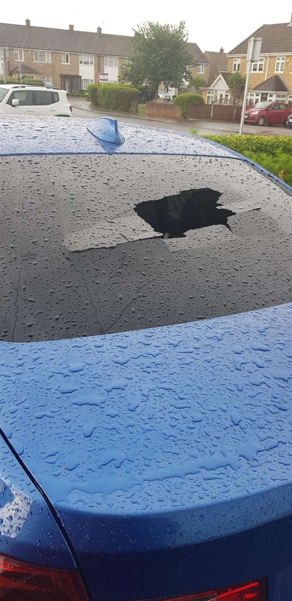 Michelle James was shocked when a hole appeared in her windscreen after a storm (14447086)