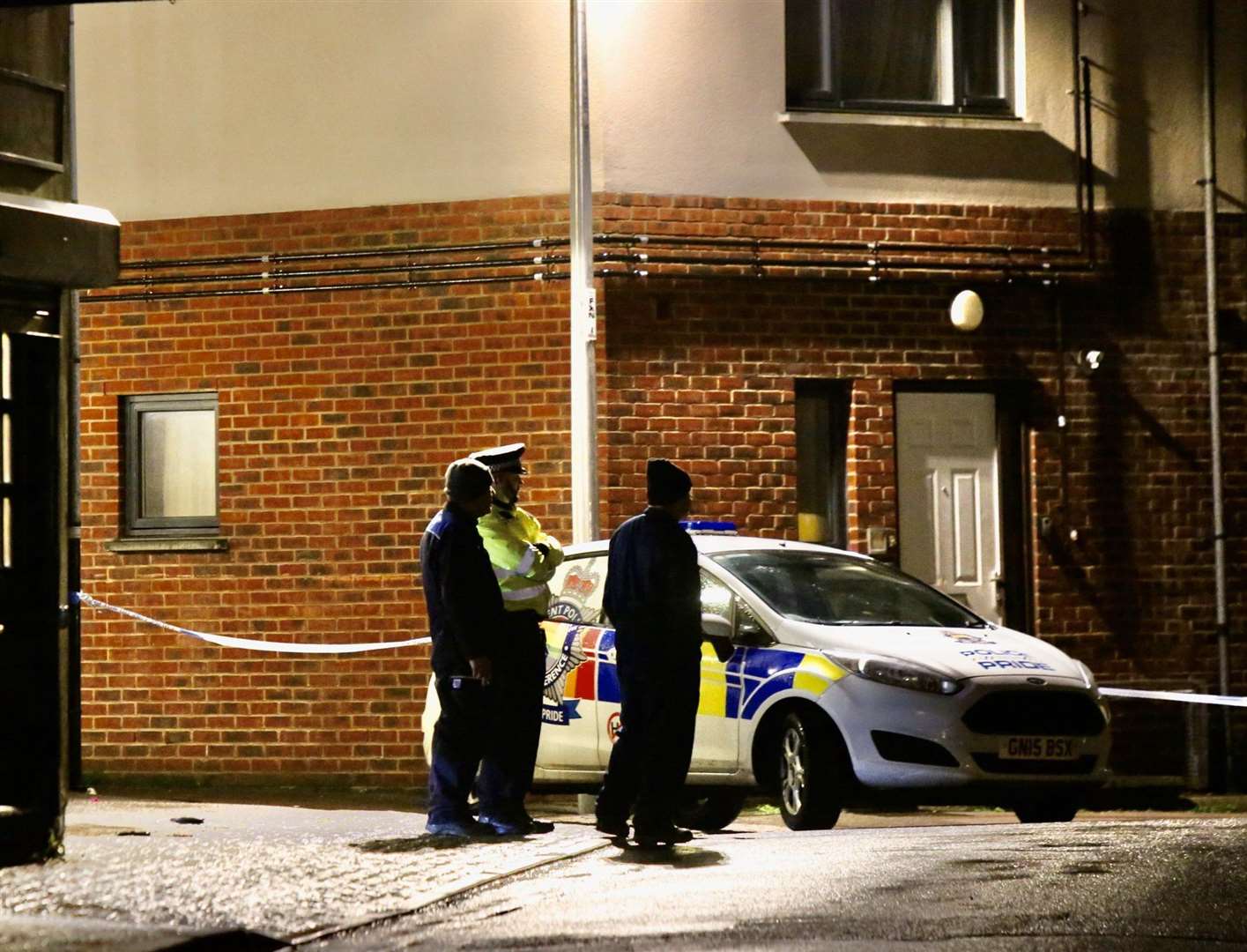 Officers at the scene in Fox Street. Pictures: UKnip
