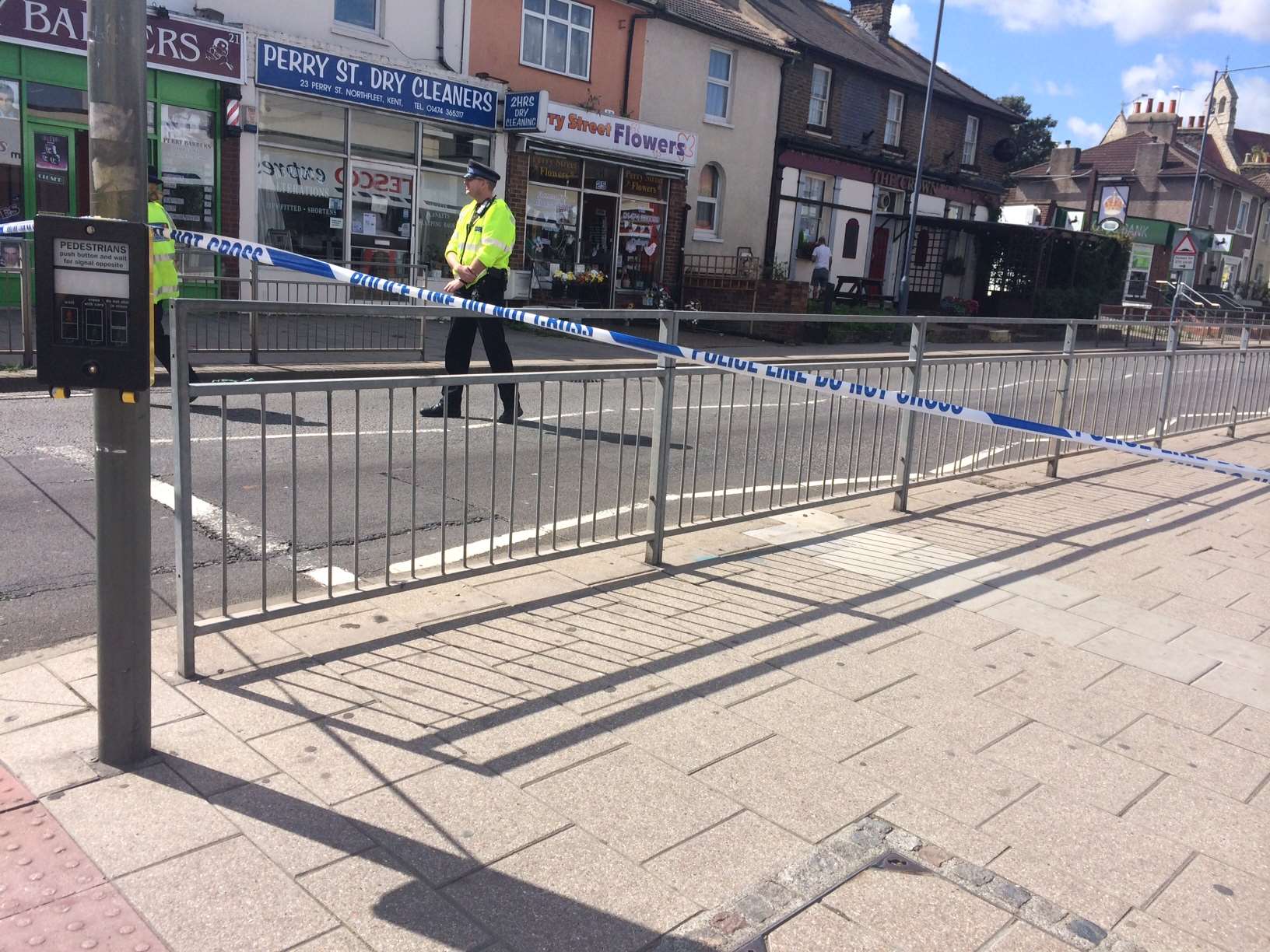 A police cordon in Perry Street, Northfleet, after the fatality