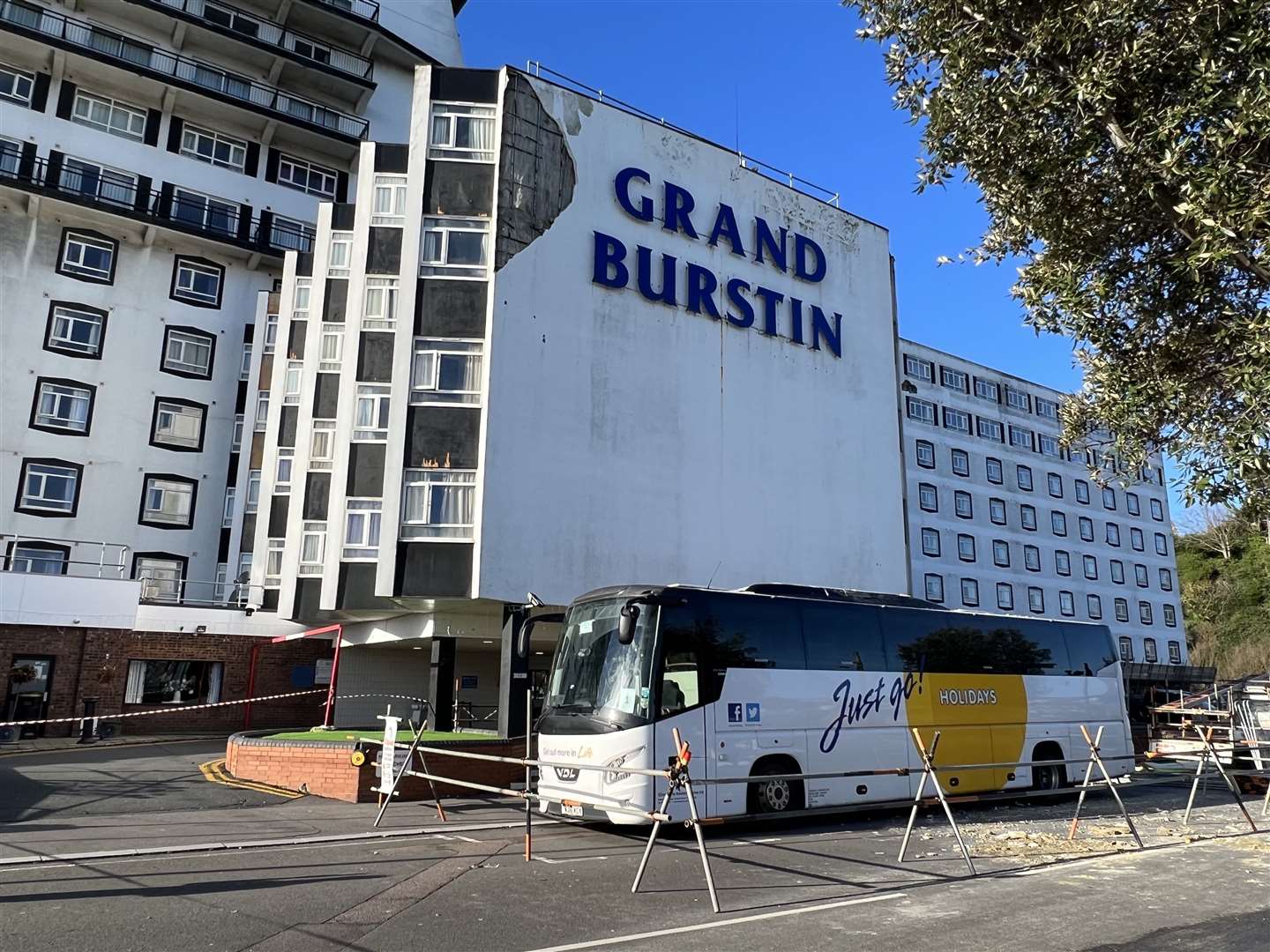 A coach driver and a holidaymaker were hurt after a section of wall at a seafront hotel came crashing down into the street in high winds in November. Pic: Barry Goodwin