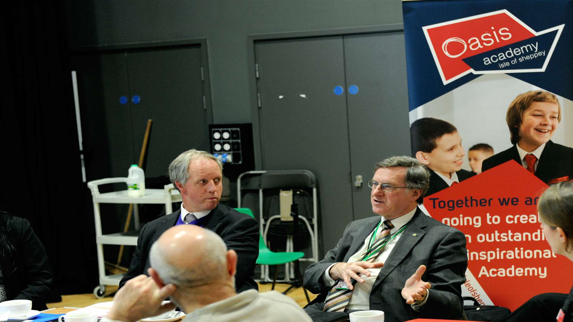 Cllr Ken Pugh (centre) makes a point during discussions at the academy