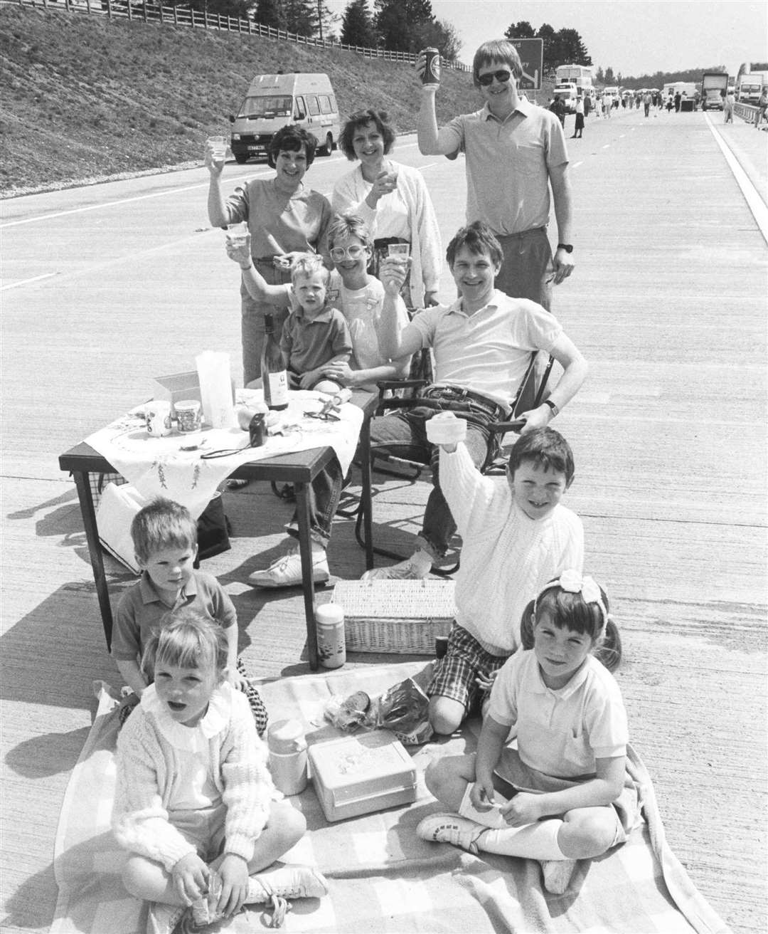 Before the official opening of the M20 section from Maidstone to Ashford, people strolled on carriageways, some rode on horse and trap, and some families held a picnic in the fast lane. Picture: "Images of Ashford" book