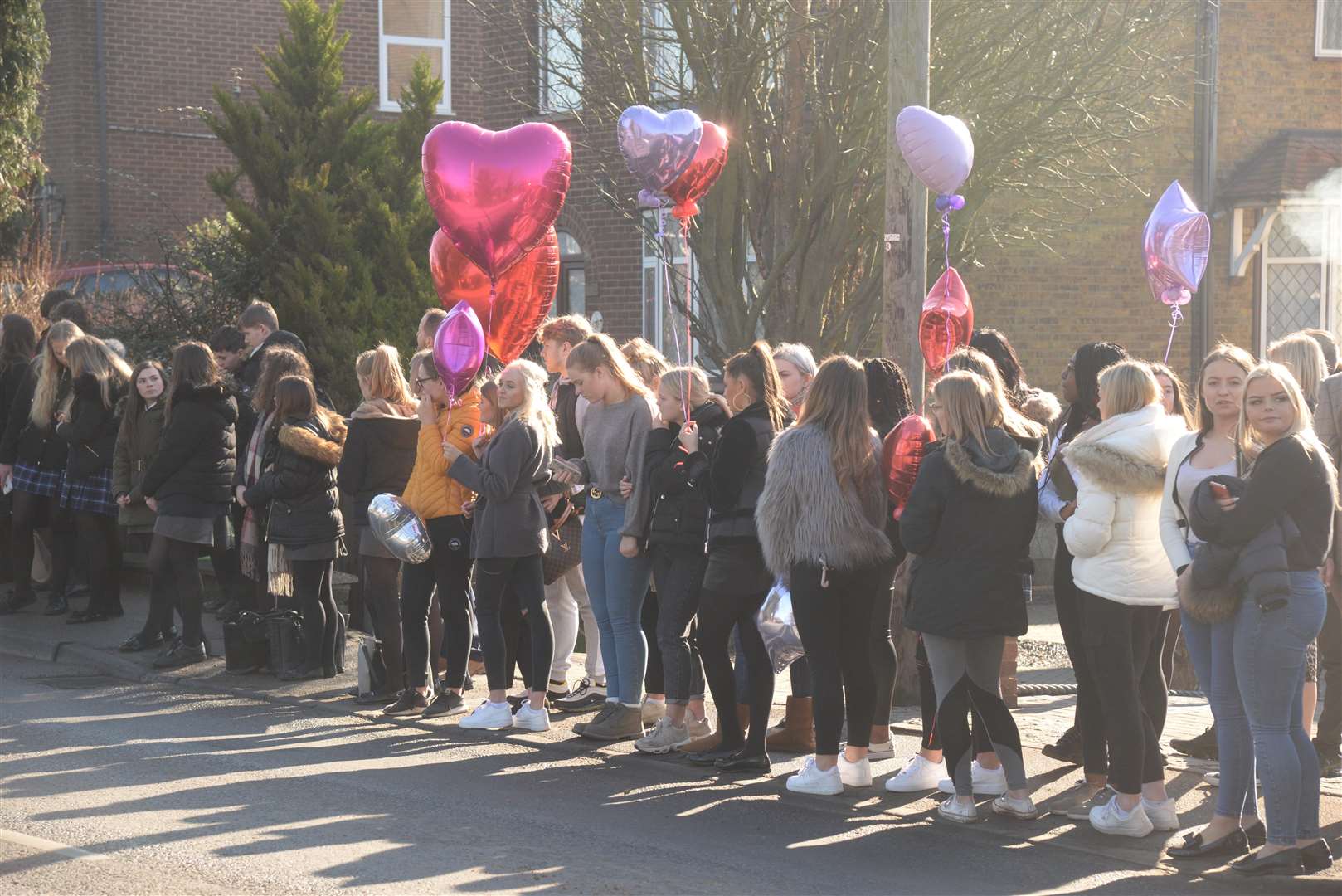 Hundreds lined the streets to say their goodbyes. Picture: Chris Davey