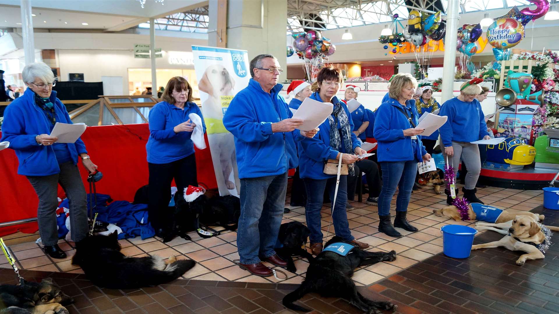 Volunteers singing carols at Hempstead Valley Shopping Centre