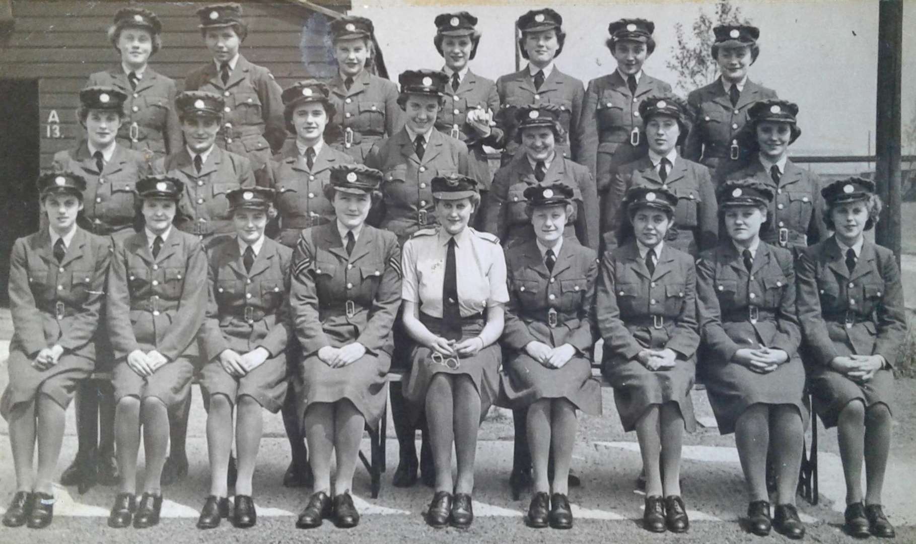 Barbara (second from left, middle row), pictured with fellow WAAF members at RAF Winslow.