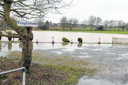 Wet enough for frogs - the appropriately named Frindsbury Cricket Club field at Upnor. Picture: Matthew Reading.