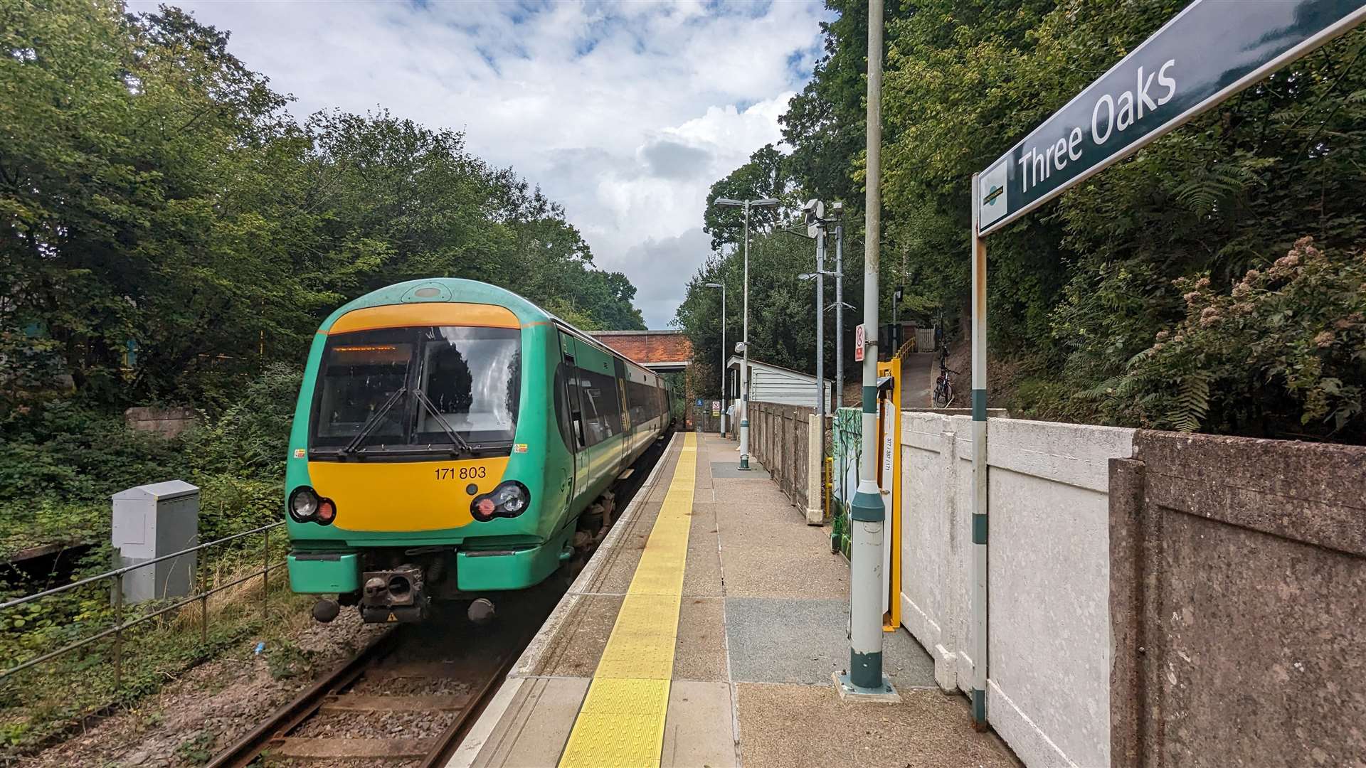 The Marshlink train pulling away from Three Oaks station on the line between Hastings and Ashford