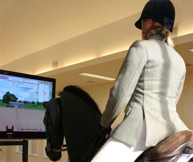 The horse simulator the school is fundraising for with interactive screen
