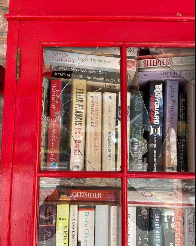 Glass panes broken by vandals on a book case for a community library in Lydden. Picture: Lydden Village Commuity Group