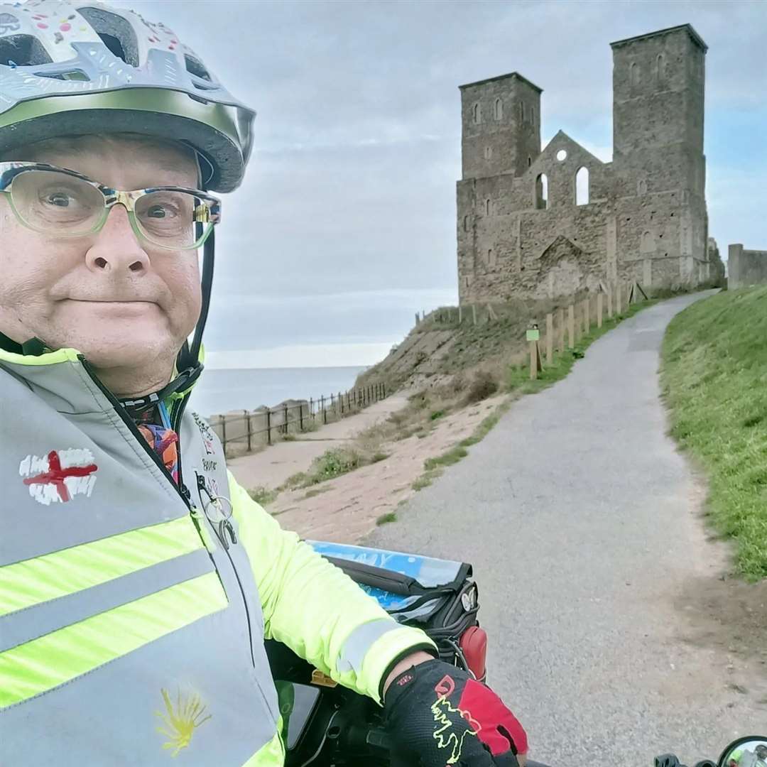 Former children's TV presenter Timmy Mallett on his bike at Reculver Towers. Copyright Timmy Mallett timmymallett.co.uk