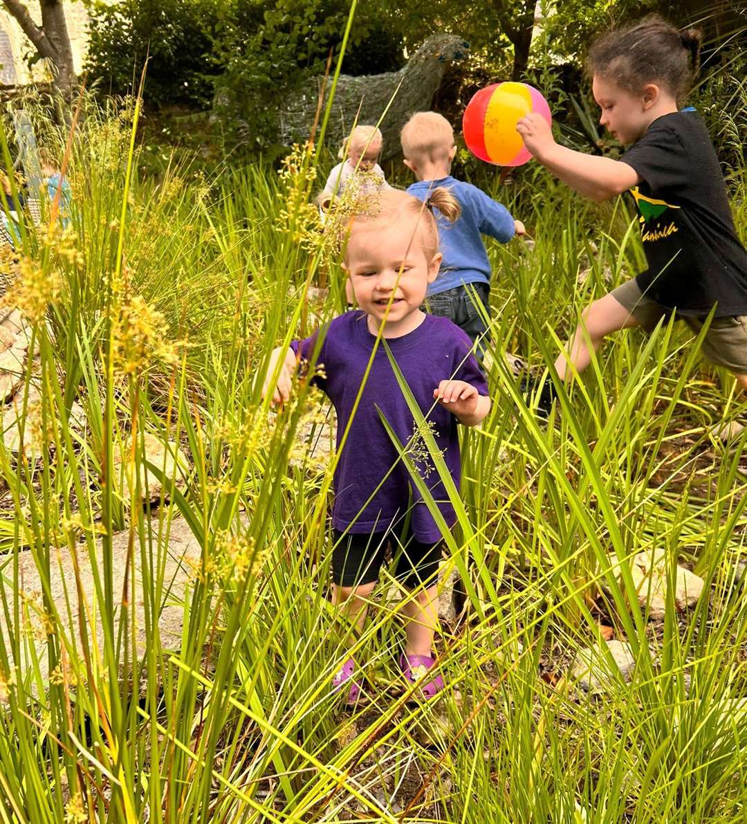 Children from Little Explorers Kindergarten and pre-school enjoying the enchanted garden in Northfleet