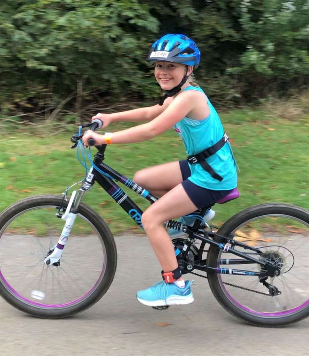 Mother of 10-year-old Olivia Phillips says despite her daughter being sick after the triathlon at Hever Castle she “has not been put off” by the event. Picture: Emma Phillips