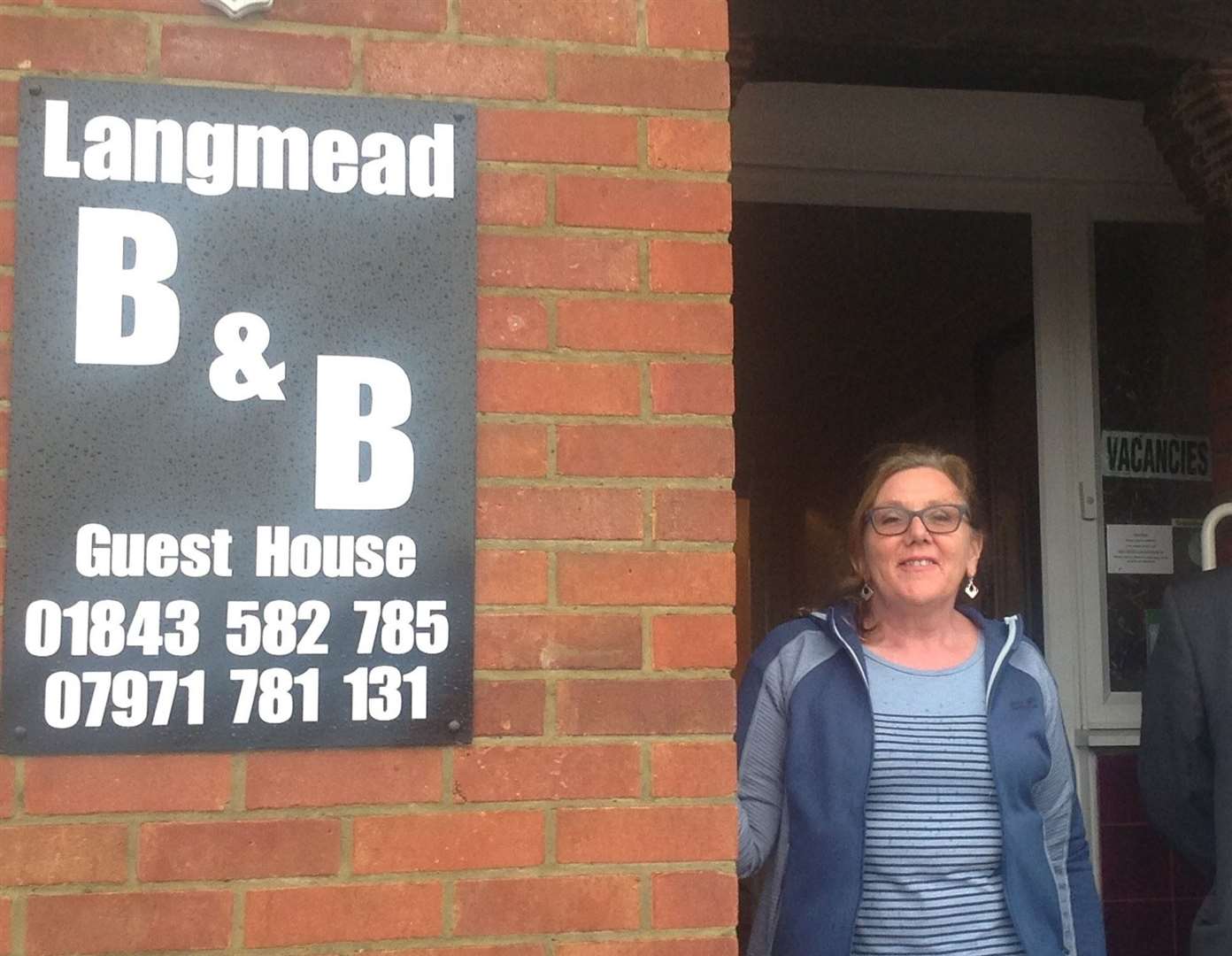 Denise Hill outside Langmead Guest House, in 2017