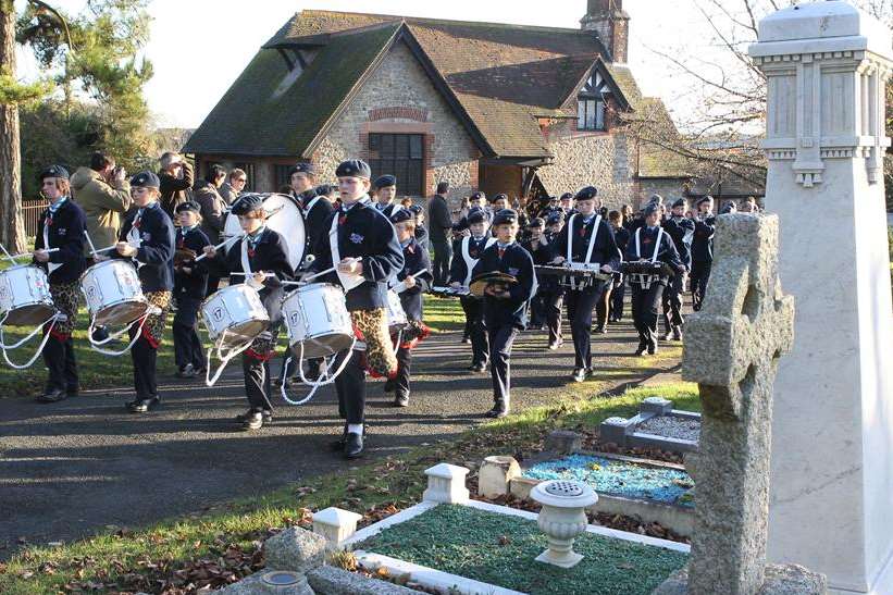 The 17th Tonbridge Scout and Guide band lead a Remembrance Sunday parade in Snodland