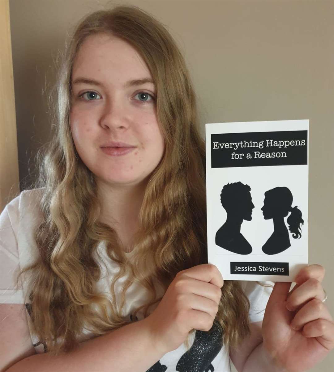 Young Maidstone author Jessica Stevens with her book