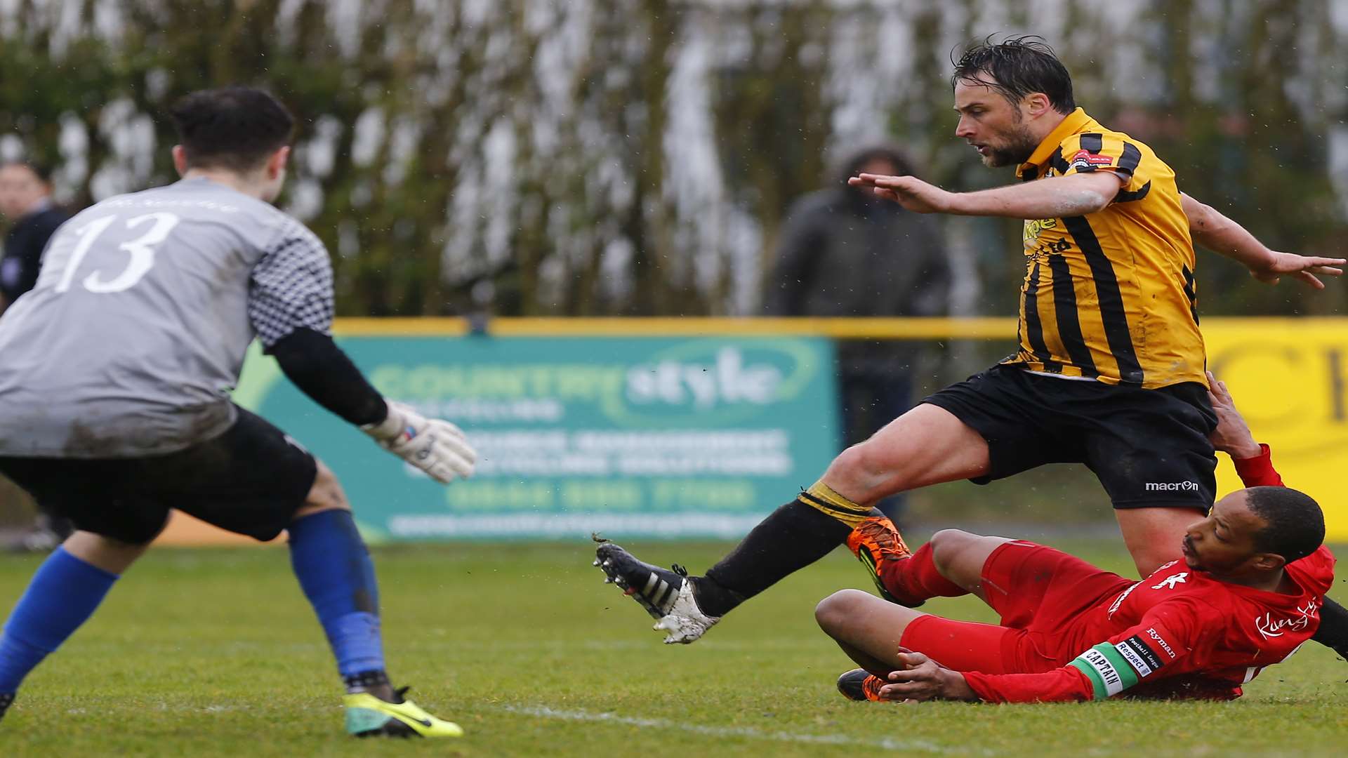 Micheal Everitt rides a tackle in the penalty area Picture: Matt Bristow