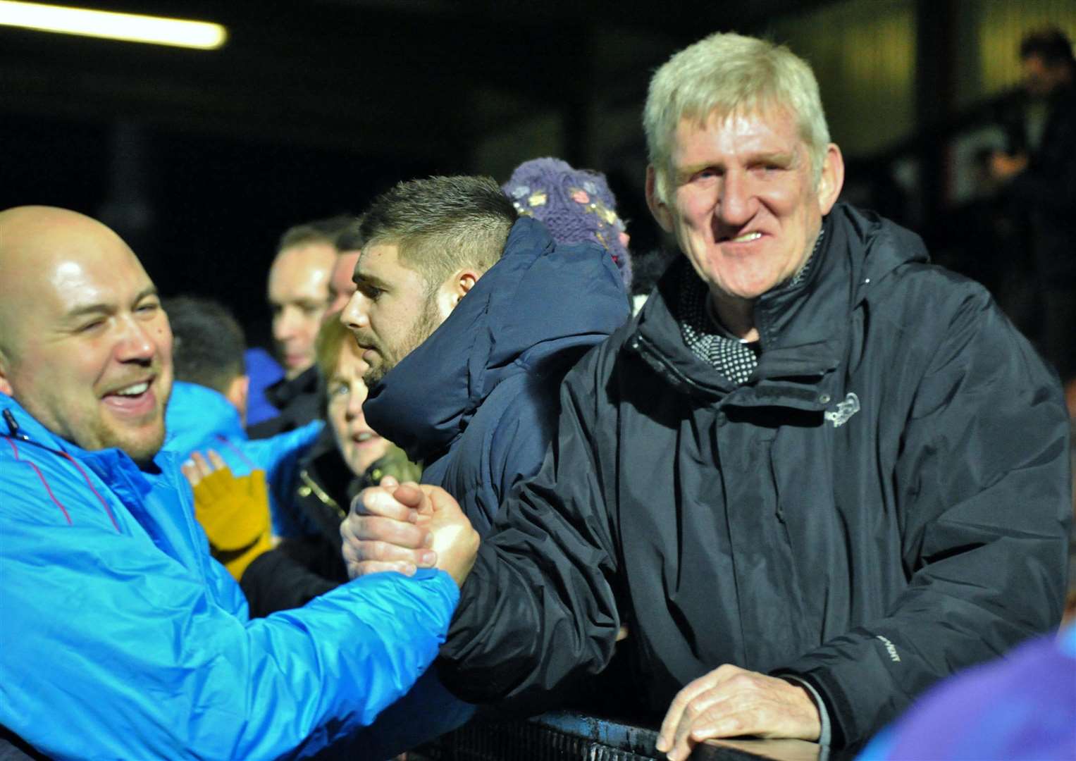 Tristan Lewis is congratulated by co-owner Terry Casey after Maidstone's victory Picture: Steve Terrell
