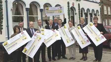 MAKING A DIFFERENCE: Cheques are presented to the hospice representatives by Jonathan Neame and Simon Irwin