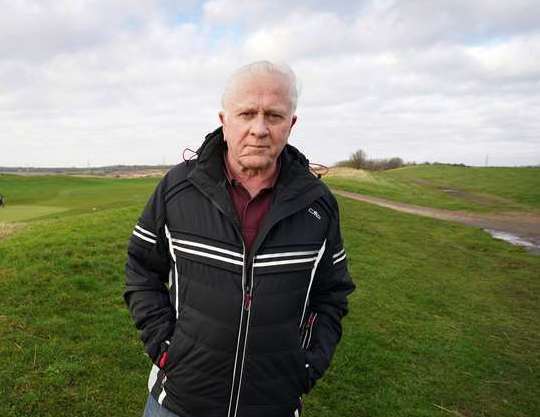 Cllr Vince Robson stands at the site of a proposed garden city development at Pedham Place Golf Course. Picture: Gareth Fuller/PA