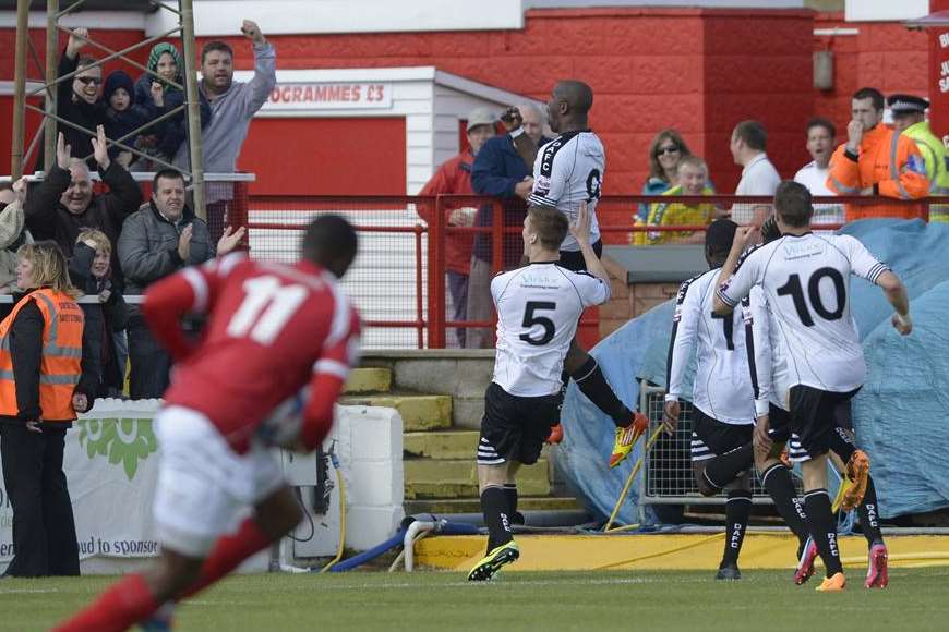Nathan Elder jumps for joy as Dover celebrate the all-important first goal. Picture: Andy Payton