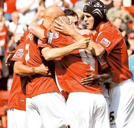 Deon Burton is congratulated on scoring Charlton's opening goal against Brentford