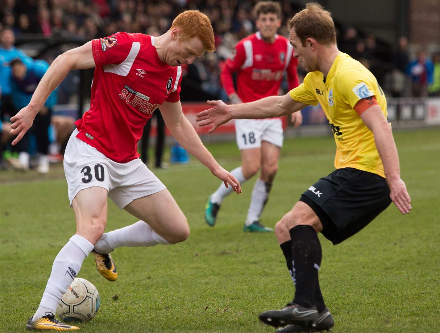 Dover's Stuart Lewis (right) in action at Salford on Saturday Picture: Salford City FC