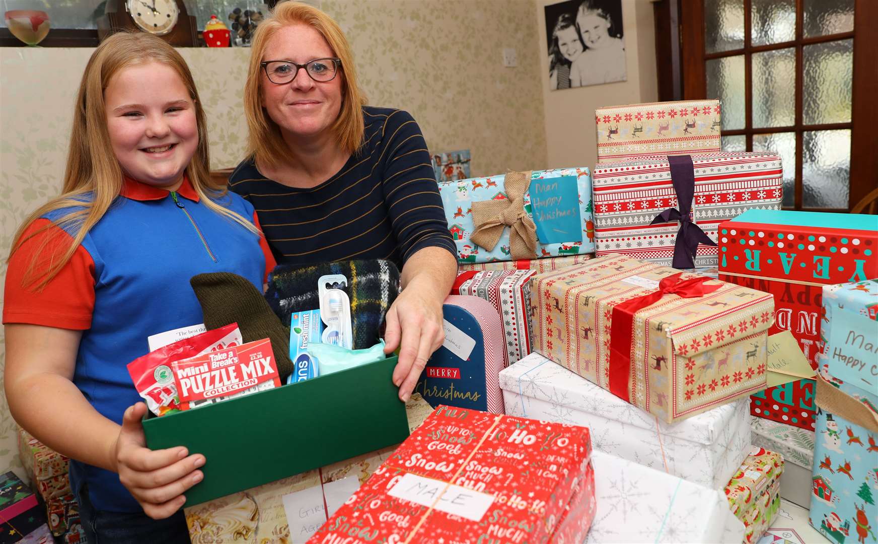 Fifi and Sarah Coccia have been collecting gift boxes for various charities