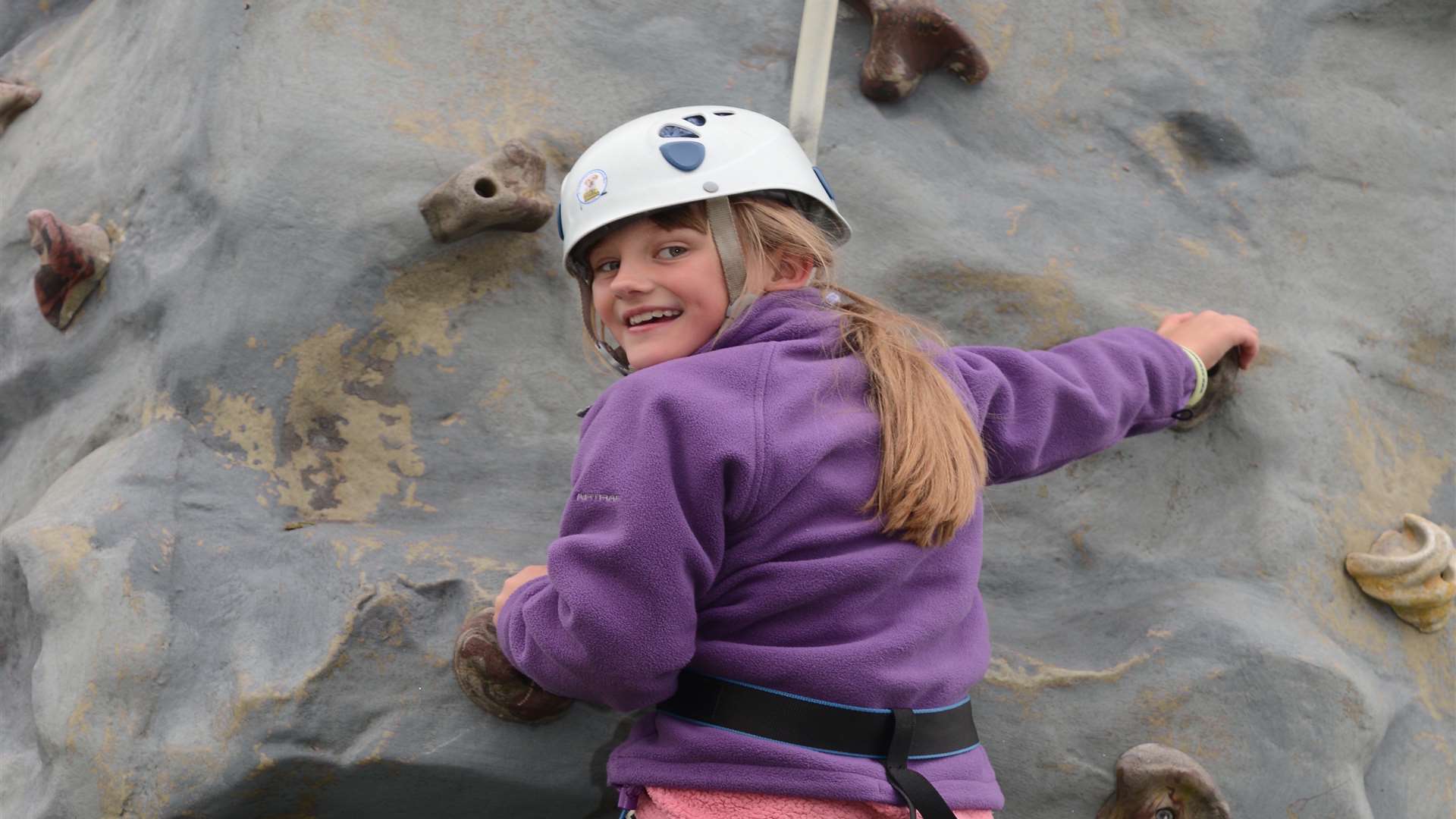 Katya Betts on the KM stand climbing wall, which was run with Kent Scouts