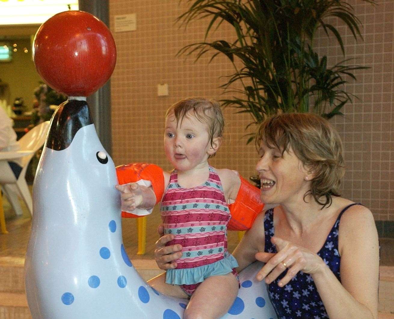 Charlotte Nicholls, aged one, and aunt Lisa Duce enjoying one of the pool parties