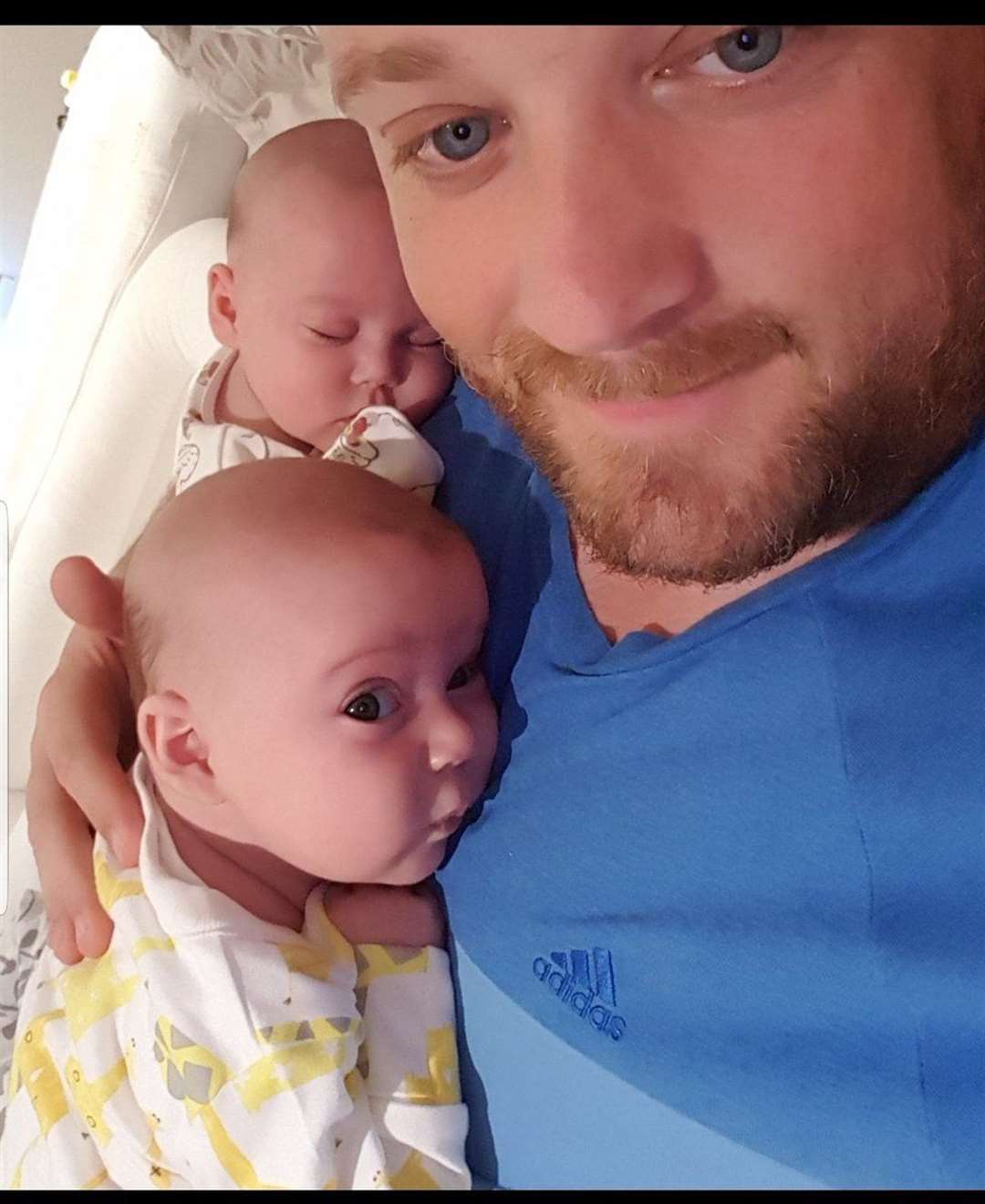Jake and Chloe as babies with dad Steven