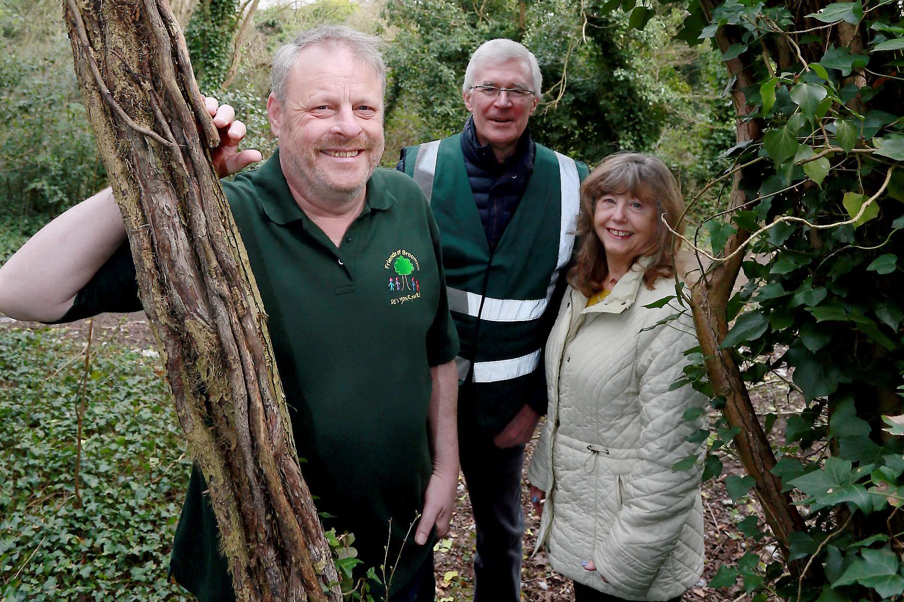 Chairman Ben Cooper, Secretary David Park and Jean Park in the orchard