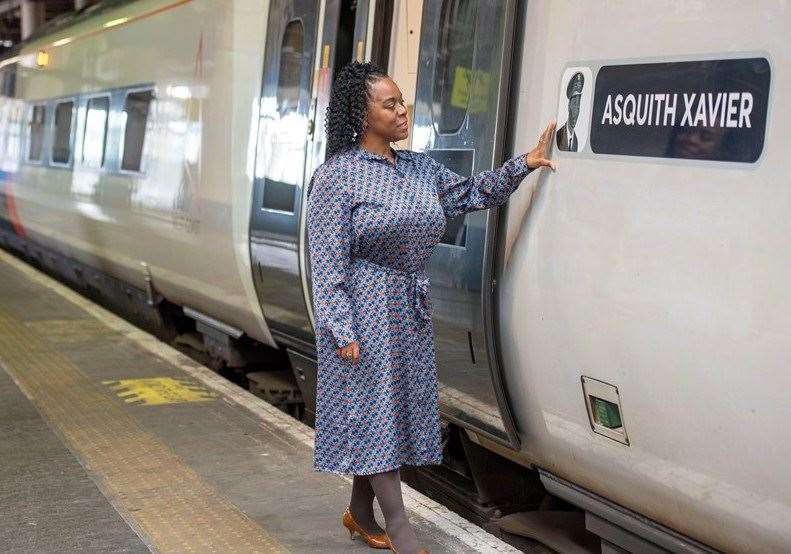 Maria Xavier at Euston alongside the train named after her father