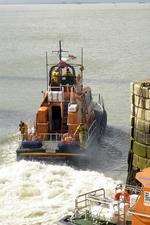 Lifeboat crews leave on a job