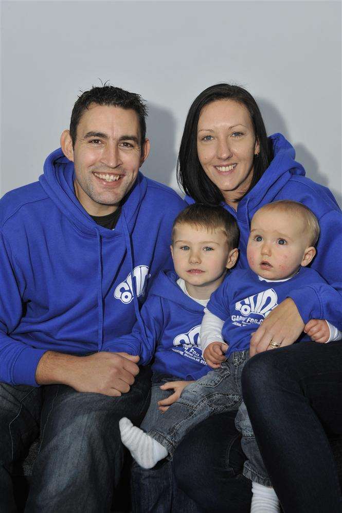 Connor Olsen, four, with his mum and dad Wayne and Georgina and baby brother Kye, from Westgate.