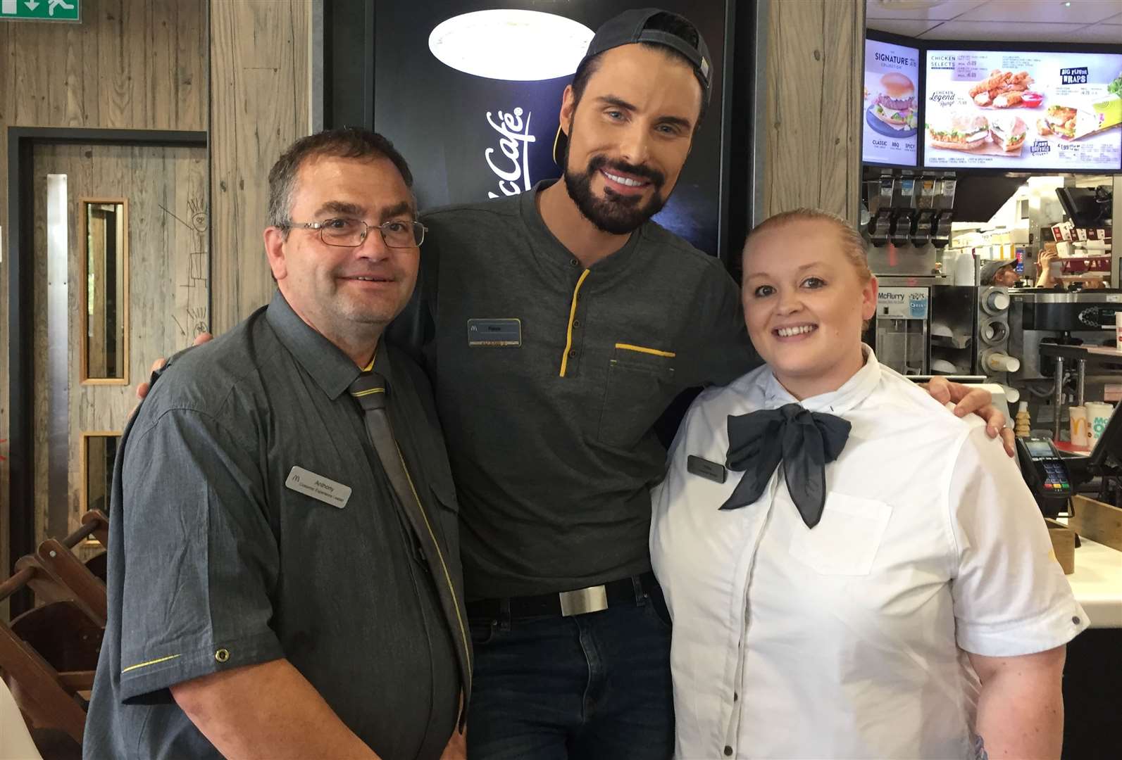 Rylan Clark-Neal with McDonald's staff Anthony Trice and Hollie Weeks