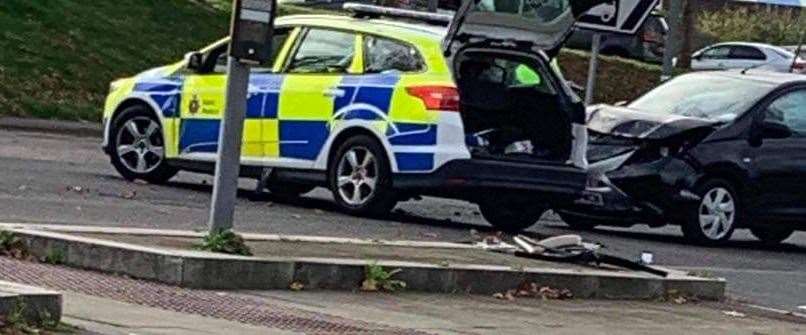 A Toyota Aygo has crashed with a police car in Chatham town centre
