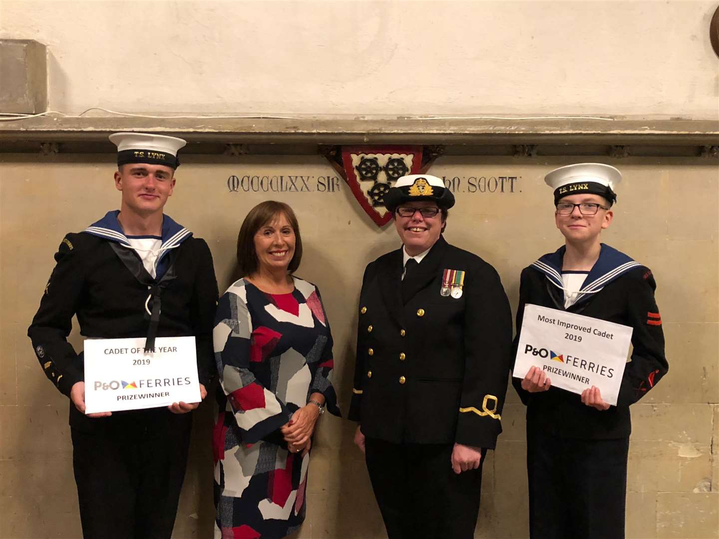 Dover & Deal Sea Cadets Nathan Clark and James McCann are presented with the P&O bursary by Lifeboat press officer Noelle Downer, watched by Sarah Butler, incumbent commanding officer