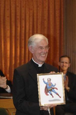 The Very Rev Robert Willis, Dean of Canterbury with a cartoon presented to him during the Freedom of the City ceremony