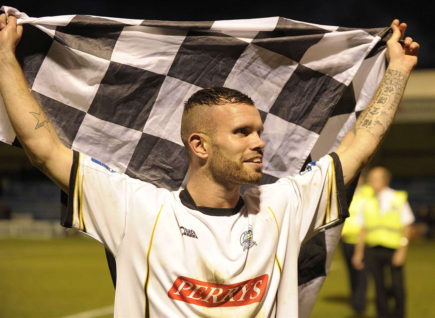 Adam Birchall celebrates Dover's famous FA Cup win at Gillingham in 2010. Picture: Barry Goodwin