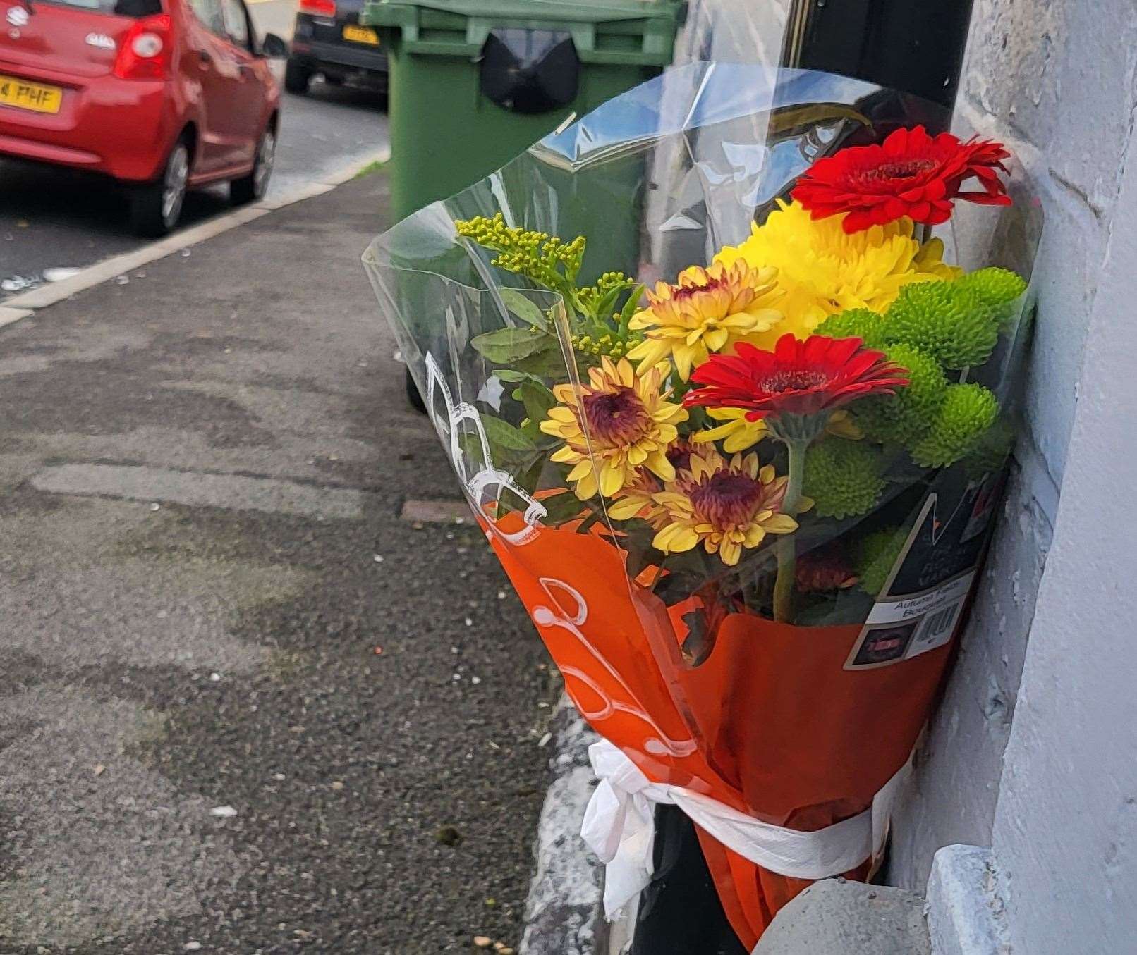 A floral tribute was placed at the scene of the fatal attack in Folkestone