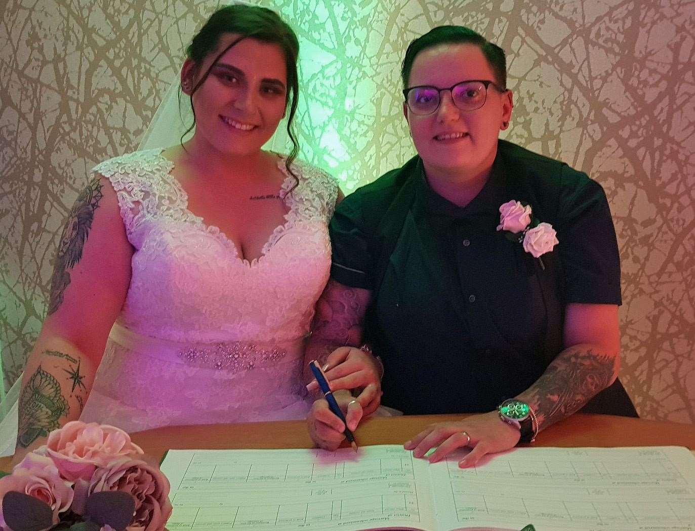 Louise Arnold-Wilson (right) and Jennifer (left) married at Runcorn Town Hall Registry Office at one minute past midnight (Halton Borough Council/PA)