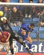 GOOD SAVE: Gills keeper Jason Brown punches the ball clear against Reading. Picture: GRANT FALVEY