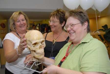 Sue Morris, Carol Bubb, who is three days older then the NHS, and Sarah Maycock at the 60th anniversary exhibition and tea party at Kent and Canterbury Hospital. Picture: Barry Duffield